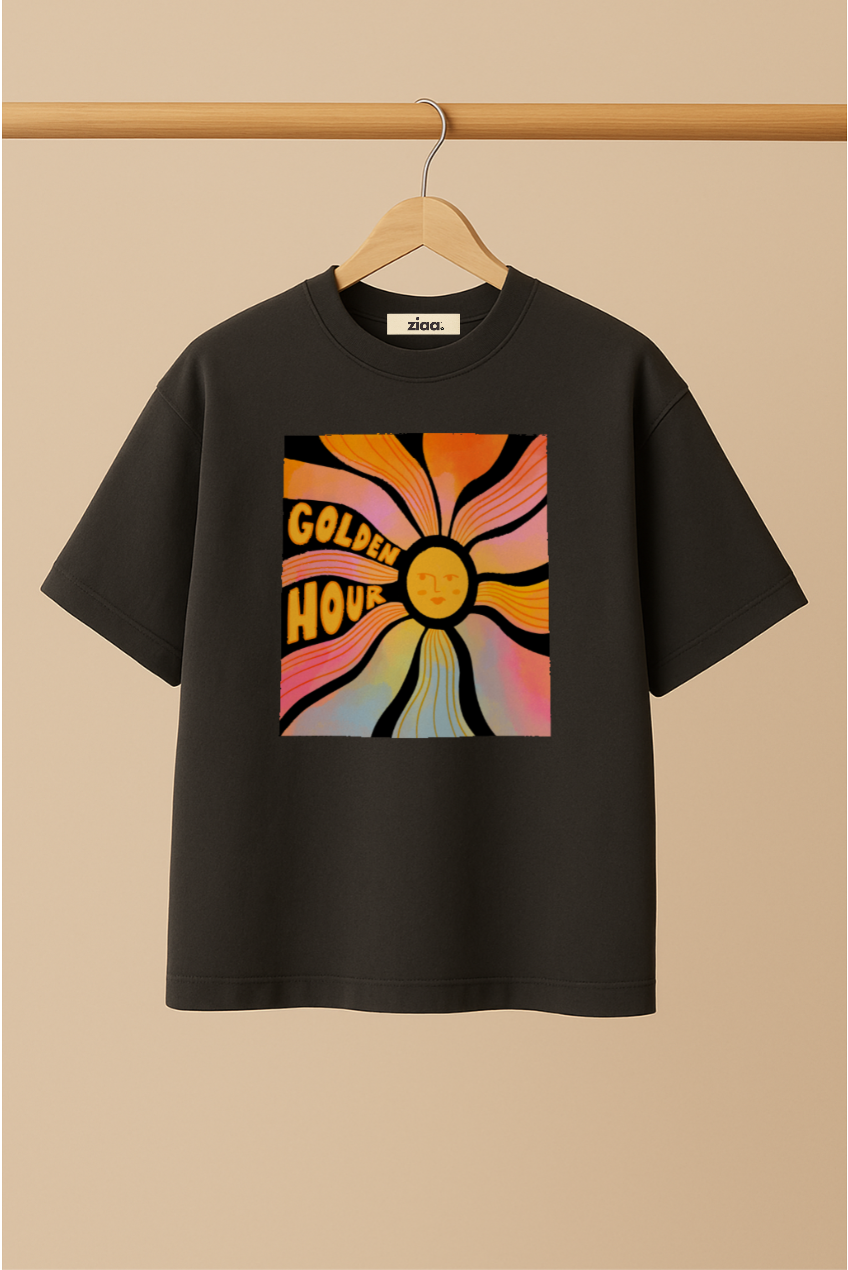 Ziaa's black t-shirt with colorful graphic design of golden hour