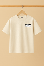 Ziaa's grown upping tee with black and white graphic design and text