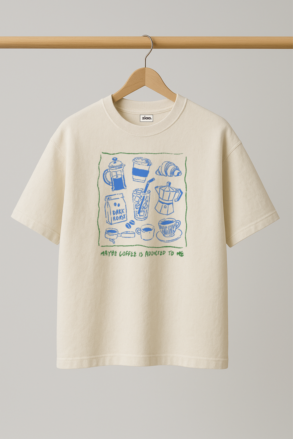 ZIAA "Maybe Coffee Is Addicted to Me" graphic t-shirt with illustration of coffee cups and pots, white color base with blue graphic
