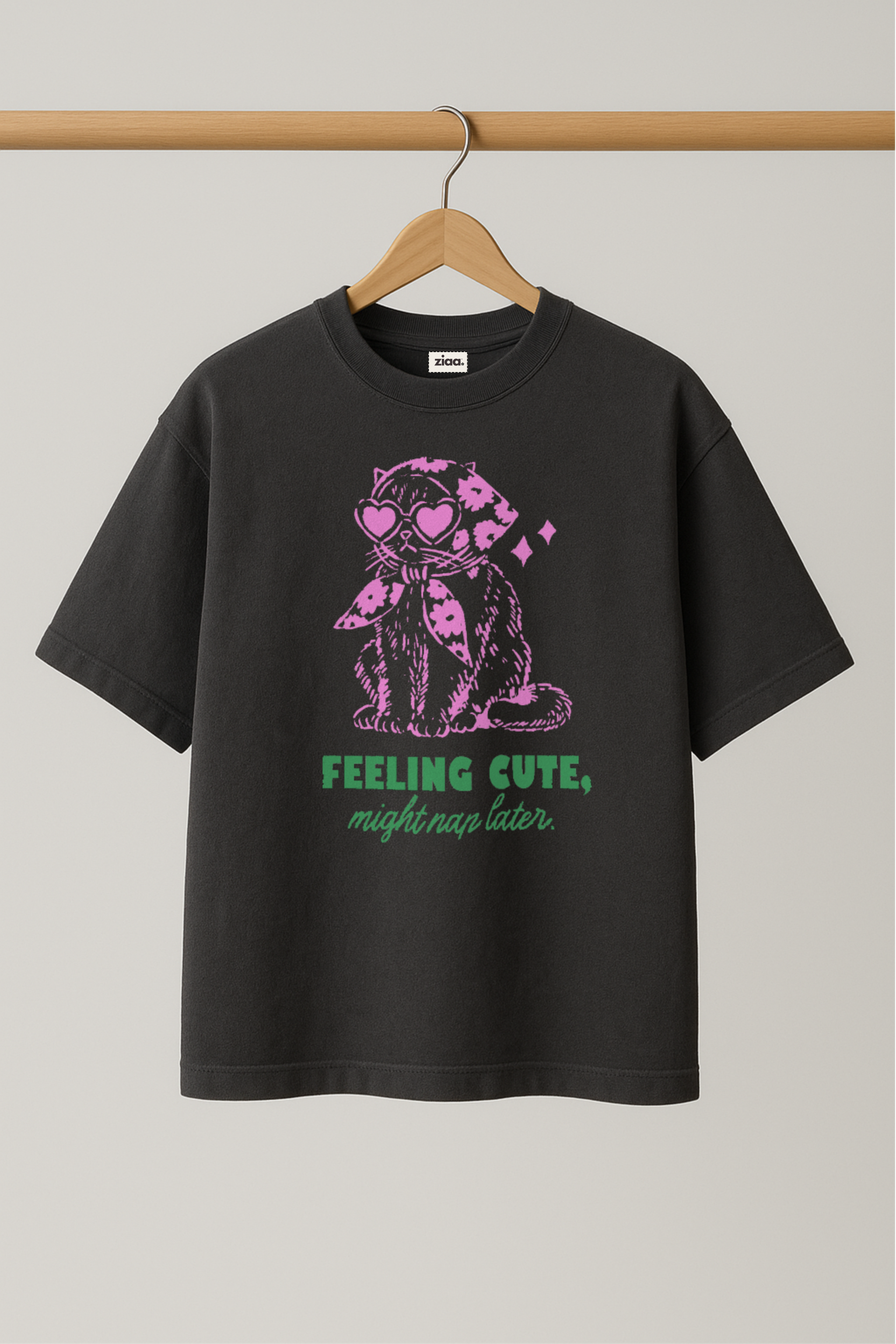 ZIAA "Feeling Cute Might Nap Later" graphic t-shirt with illustration of a cat wearing headscarf and shades, dark grey color base with pink and green graphic