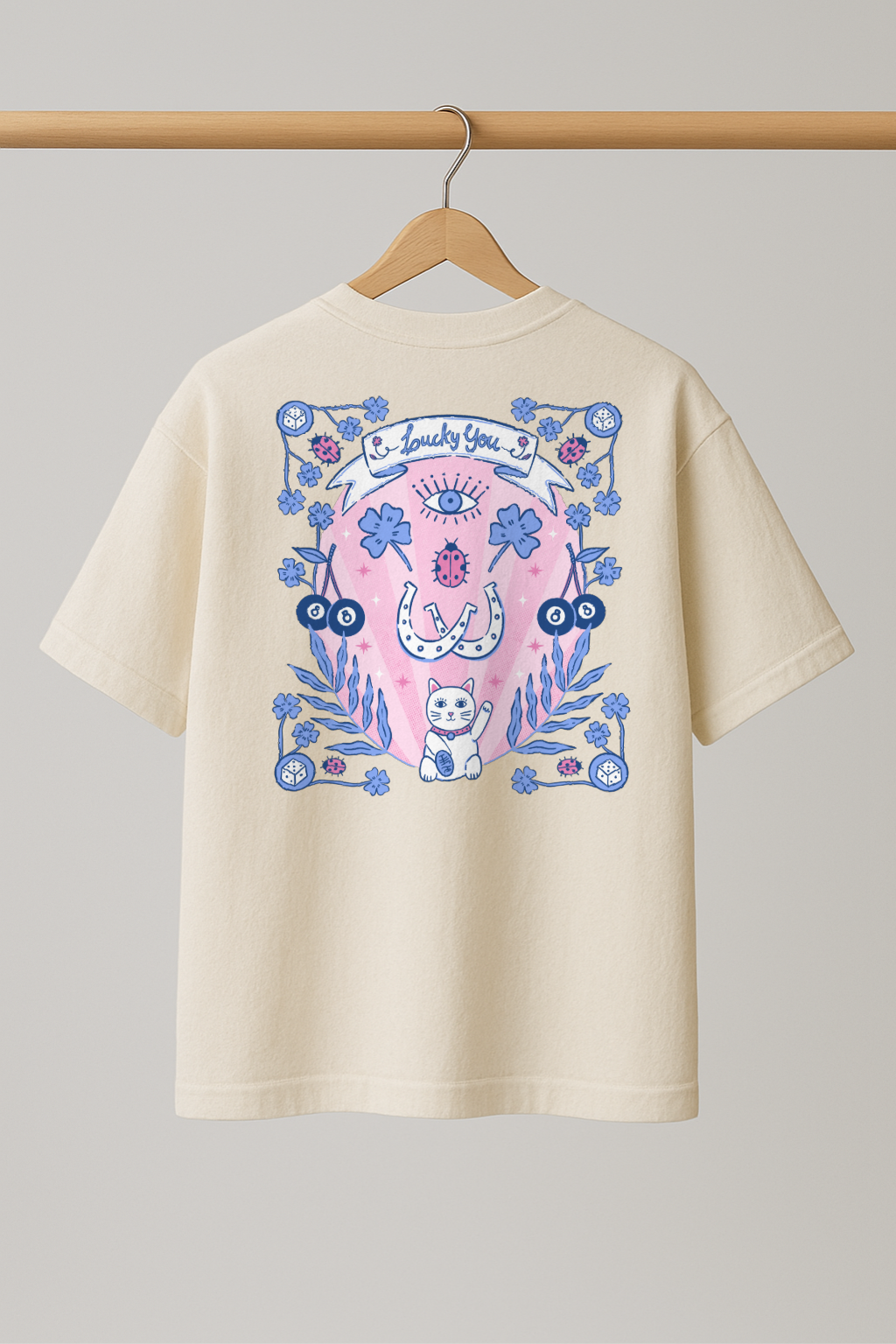 ZIAA "Lucky You" graphic t-shirt with illustration of a lucky cat and other lucky items, white color base with blue and pink graphic