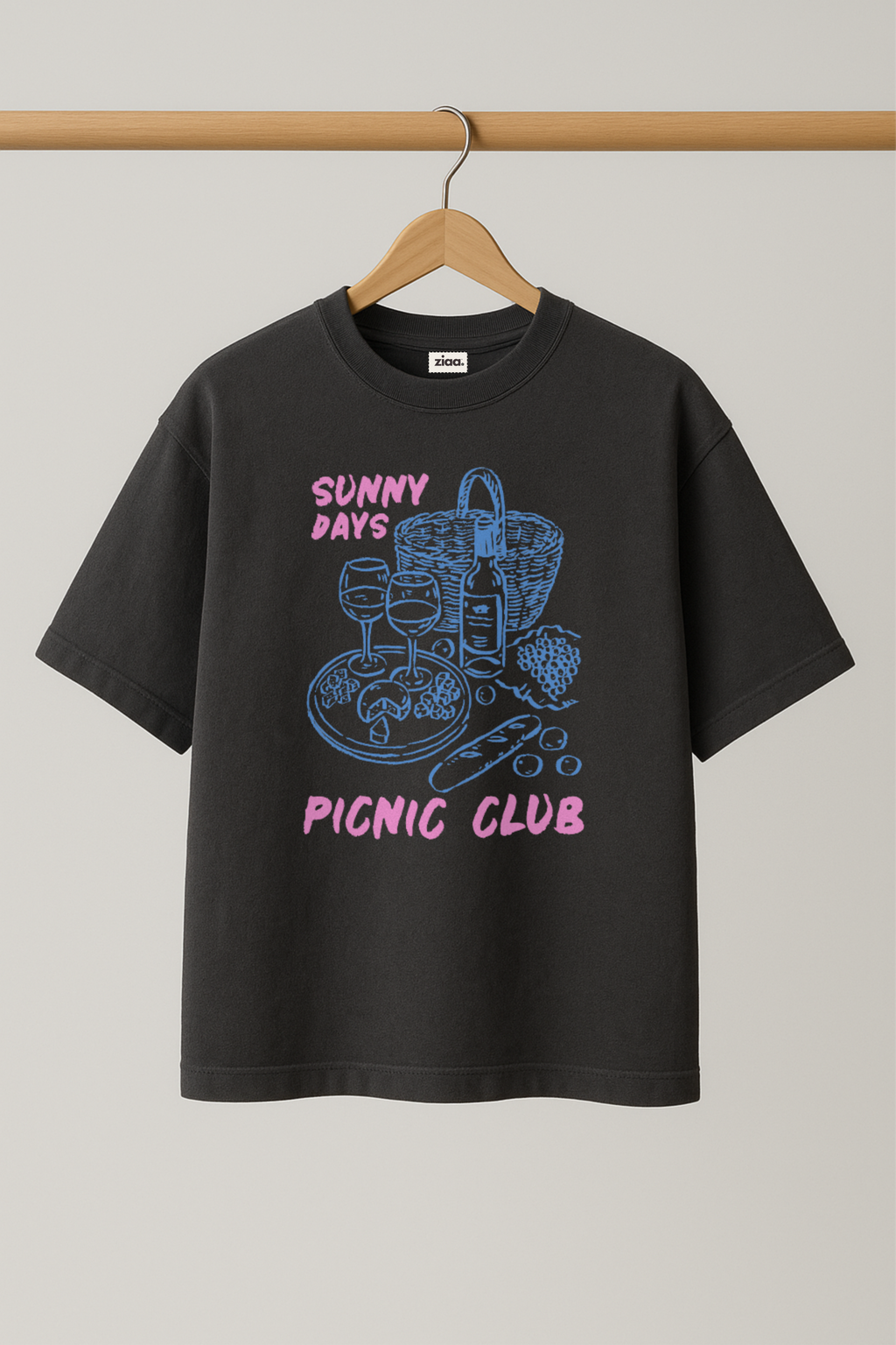 ZIAA "Sunny Days Picnic Club" graphic t-shirt with illustration of picnic items, dark grey color base with pink and blue graphic